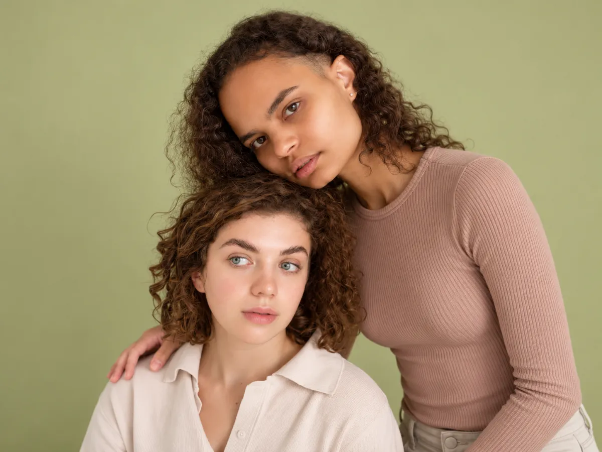 Melanin-rich skin showing concerns such as dark spots, acne marks, and uneven tone